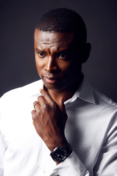 Photo of Man in White Shirt With Round Black Analog Watch